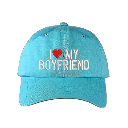 Aqua baseball hat embroidered with the phrase I love my boyfriend but love is a heart- DSY Lifestyle