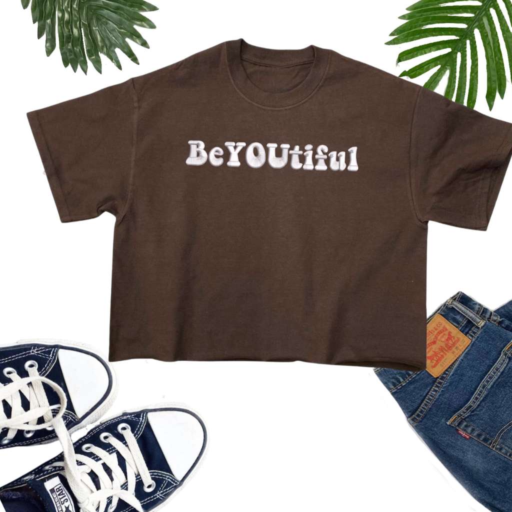 Flay lay of a brown Crop Top embroidered with BeYoutiful - DSY Lifestyle