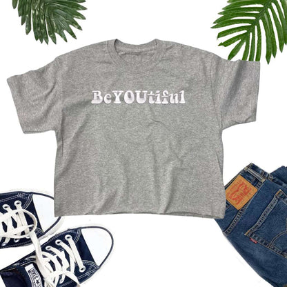 Flay lay of a Gray Crop Top embroidered with BeYoutiful - DSY Lifestyle