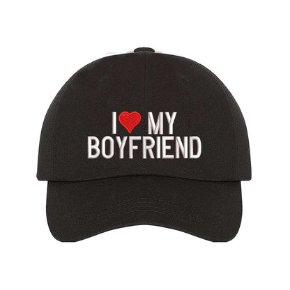 Black baseball hat embroidered with the phrase I love my boyfriend but love is a heart- DSY Lifestyle
