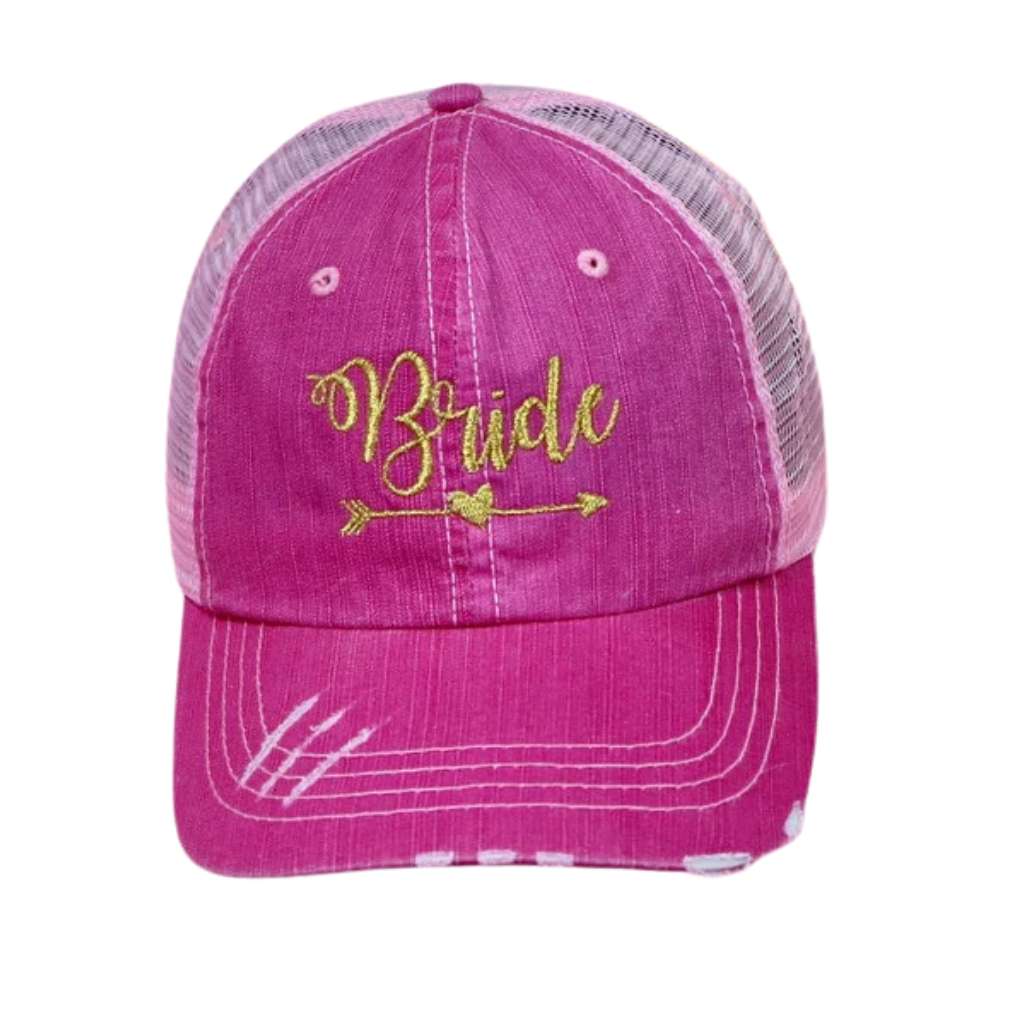 Light Pink distressed trucker hat with Bride embroidered on the front in elegant lettering, featuring a breathable mesh back and adjustable snap closure for a comfortable and stylish fit.