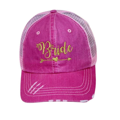 Light Pink distressed trucker hat with Bride embroidered on the front in elegant lettering, featuring a breathable mesh back and adjustable snap closure for a comfortable and stylish fit.