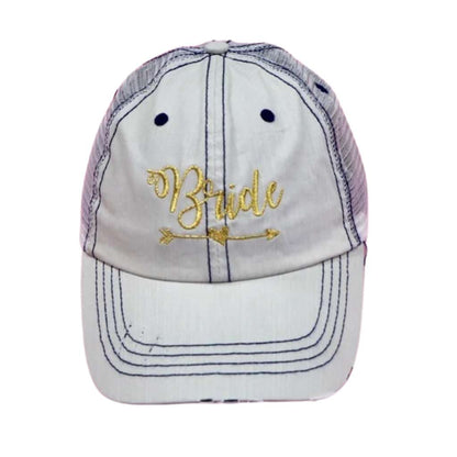 Putty distressed trucker hat with Bride embroidered on the front in elegant lettering, featuring a breathable mesh back and adjustable snap closure for a comfortable and stylish fit.