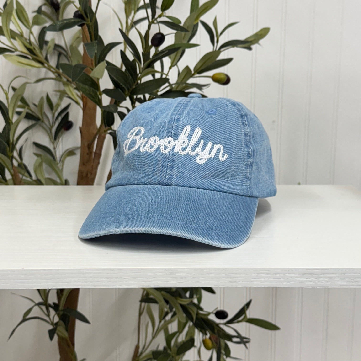 Light Denim Brooklyn Chain Stitch Embroidered Baseball Hat with detailed chain stitch embroidery, a curved brim, and an adjustable strap, perfect for Brooklyn lovers and streetwear fans - DSY Lifestyle