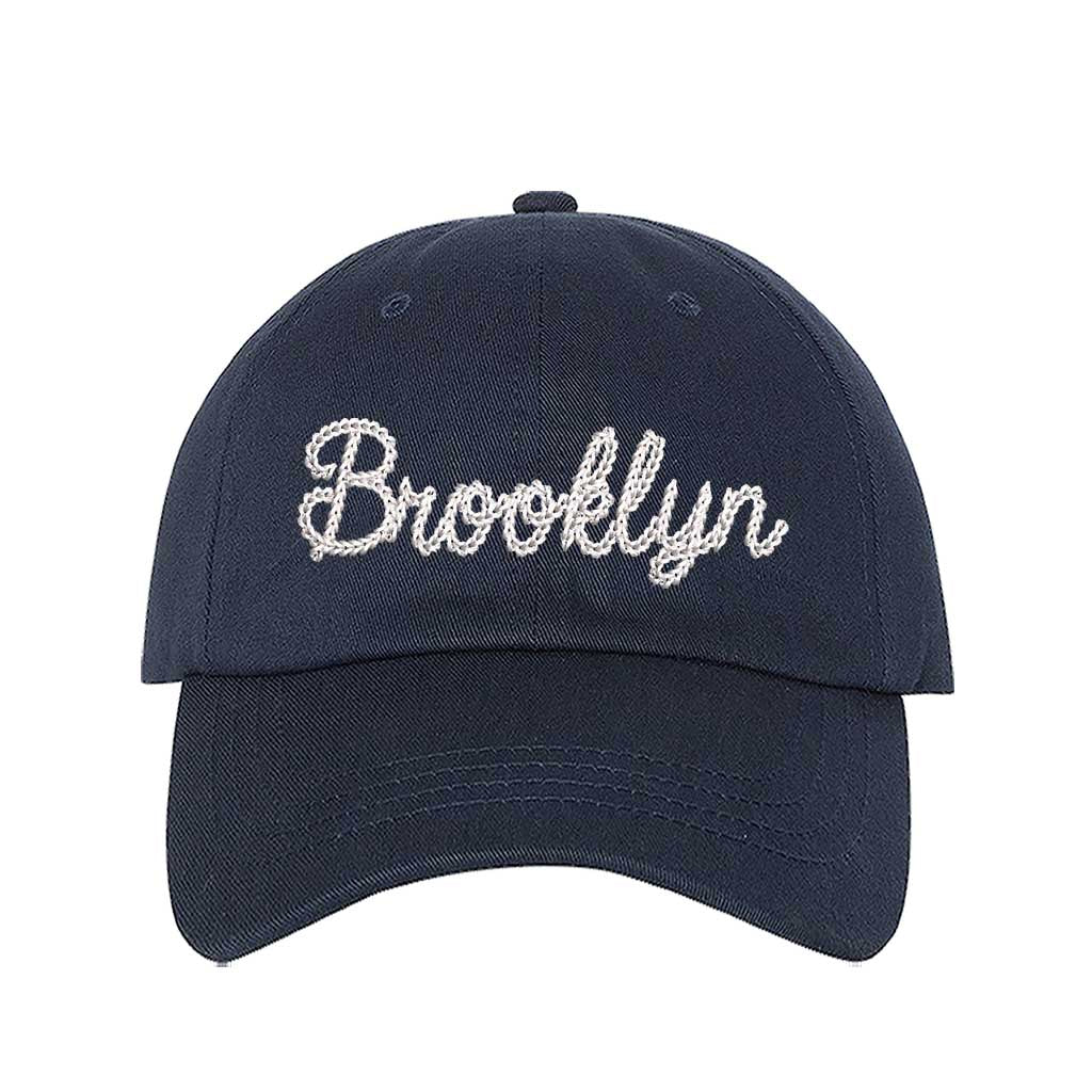 Navy Blue Brooklyn Chain Stitch Embroidered Baseball Hat with detailed chain stitch embroidery, a curved brim, and an adjustable strap, perfect for Brooklyn lovers and streetwear fans - DSY Lifestyle