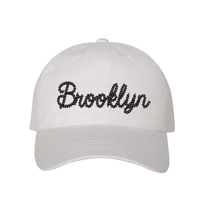 White Brooklyn Chain Stitch Embroidered Baseball Hat with detailed chain stitch embroidery, a curved brim, and an adjustable strap, perfect for Brooklyn lovers and streetwear fans - DSY Lifestyle