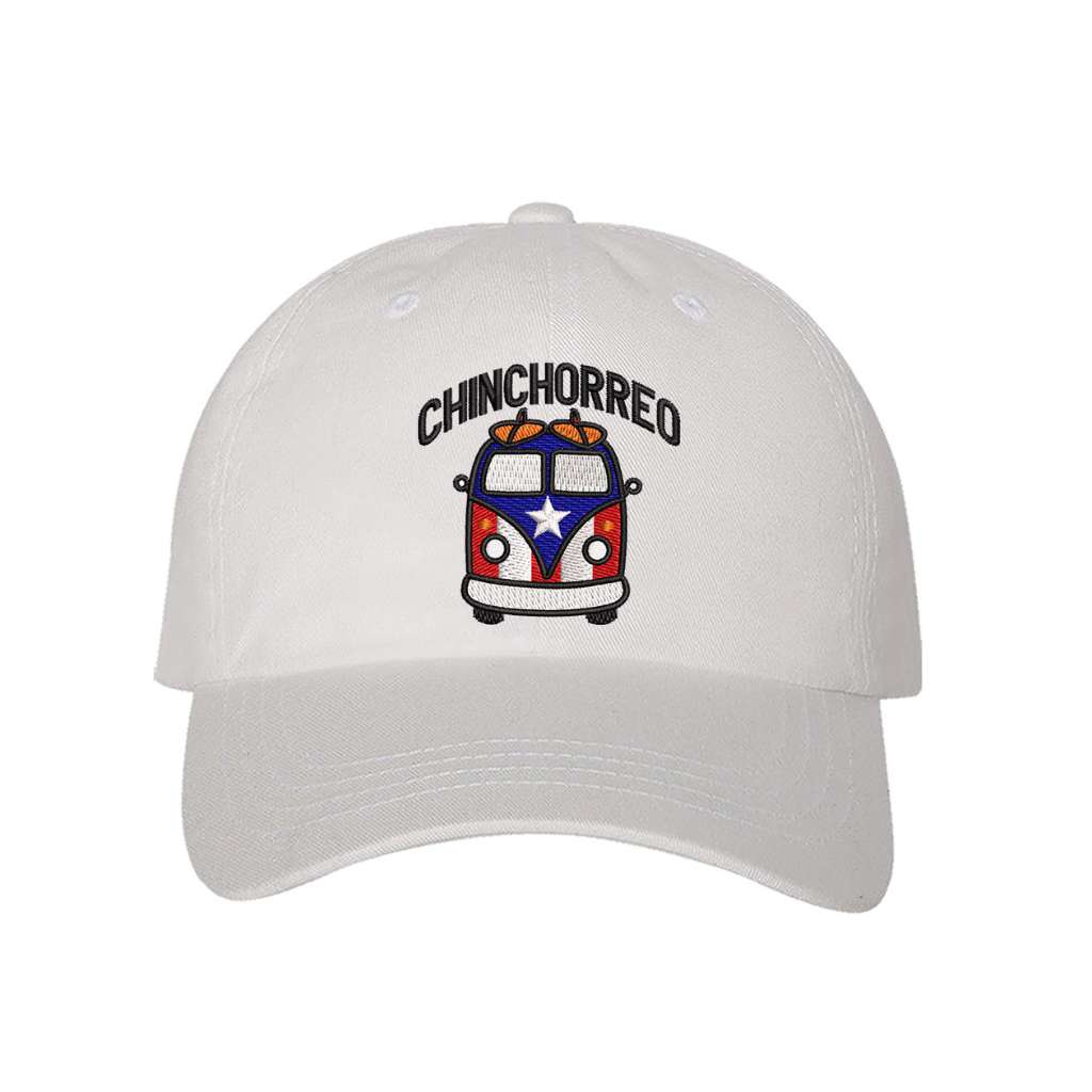 White baseball hat embroidered with the phrase chinchorreo and a van with the puertorican flag on it- DSY Lifestyle