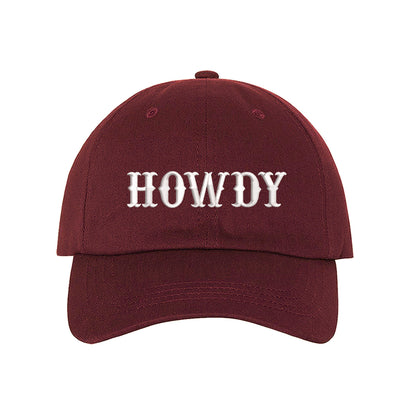 Burgandy hat embroidered with the word Howdy-DSY Lifestyle