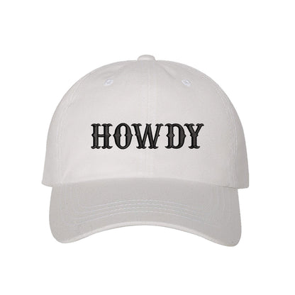 White hat embroidered with the word Howdy-DSY Lifestyle