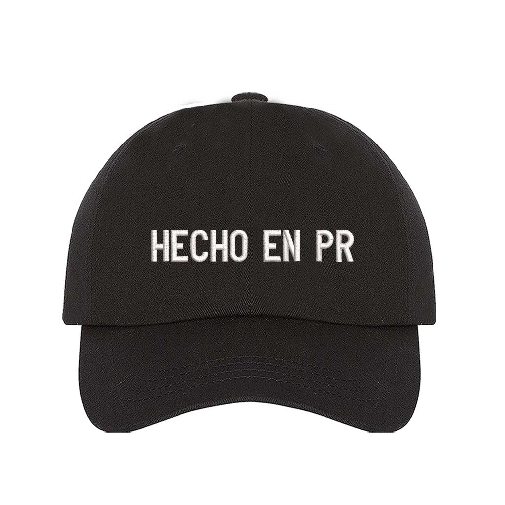 Black embroidered baseball hat with &quot;Hecho En PR&quot; stitched in bold lettering, representing Puerto Rican pride and heritage - DSY Lifestyle