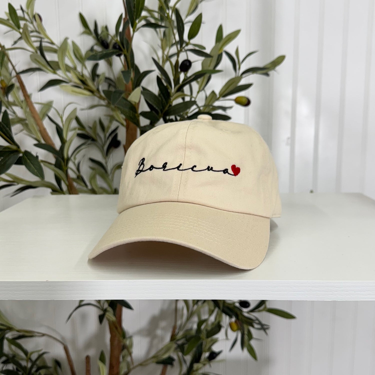 Stone embroidered baseball hat with &quot;Boricua&quot; stitched in cursive and a small heart accent, symbolizing Puerto Rican pride and love - DSY Lifestyle 