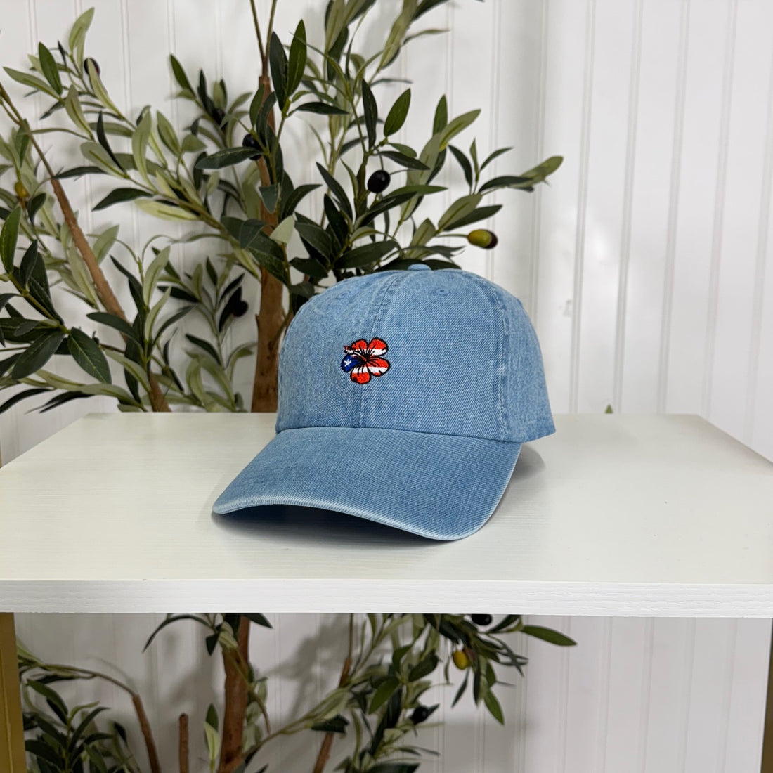 Light Denim baseball hat embroidered with a Puerto Rican Amapola shaped flag, representing Puerto Rican culture and beauty - DSY Lifestyle