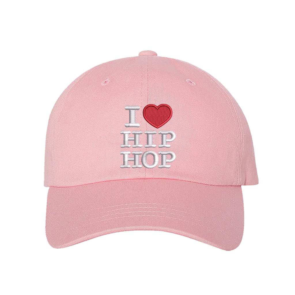 Light pink baseball hat embroidered with the phrase i love hip hop but love is a heart- DSY Lifestyle