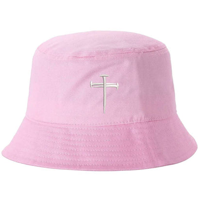 Light pink bucket hat embroidered wiht a cross made of nails on it- DSY Lifestyle