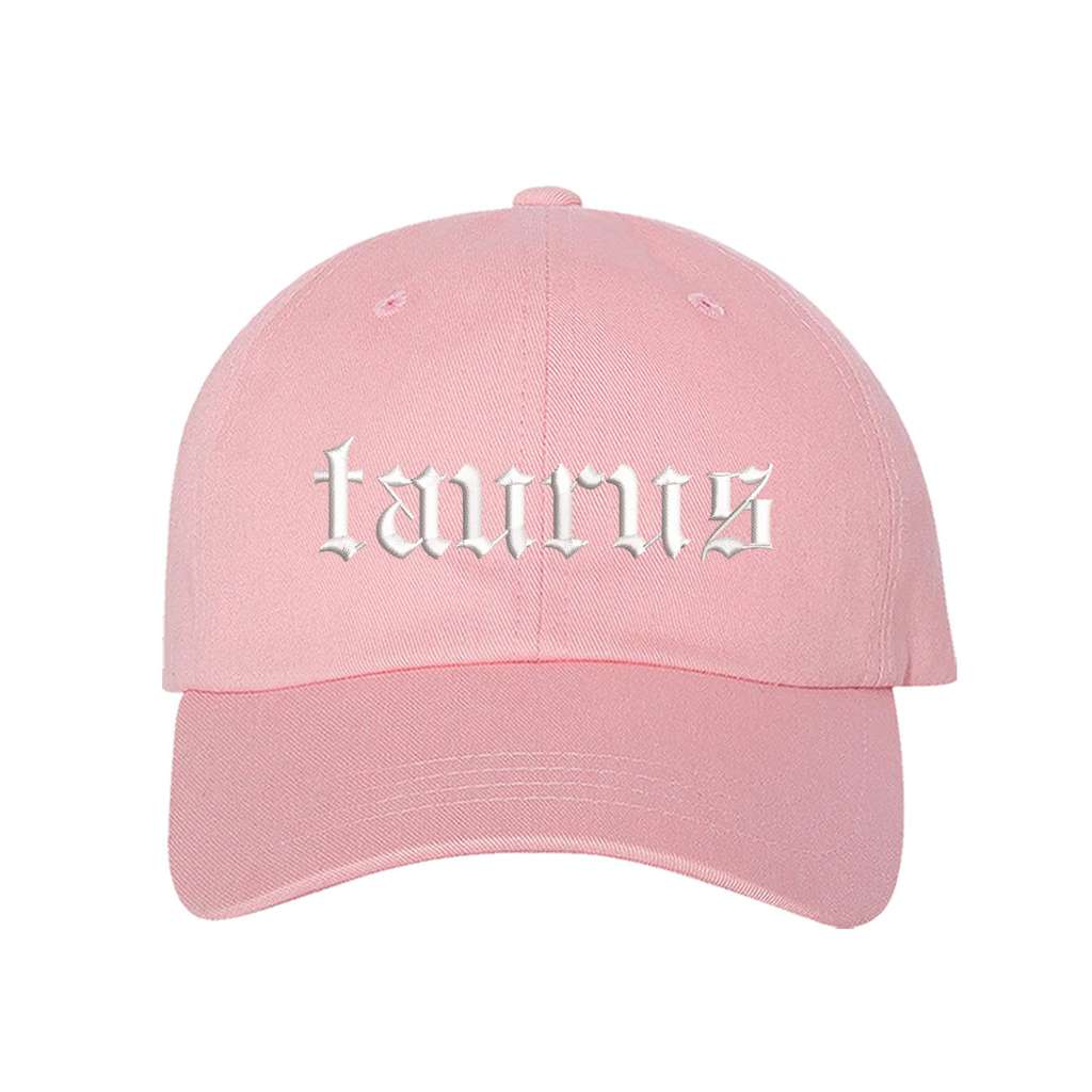 Light pink baseball hat embroidered with the word taurus in english writing on it-DSY Lifestyle