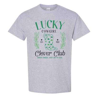 Woman wearing a Heather Gray color unisex shirt with Lucky Cowgirl with boots clover club for St Patricks Day - DSY Lifestyle