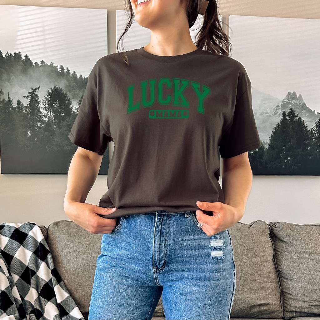 Women Wearing a brown tshirt printed with lucky Mama for St Patricks Day - DSY Lifestyle