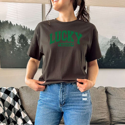 Women Wearing a brown tshirt printed with lucky Mama for St Patricks Day - DSY Lifestyle