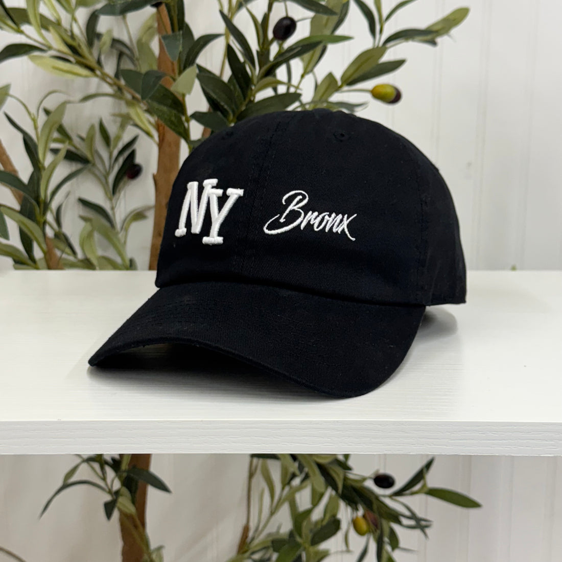 Black NY 3D Bronx Embroidered Baseball Cap with raised embroidery, a curved brim, and an adjustable strap, celebrating New York’s iconic borough in style - DSY Lifestyle