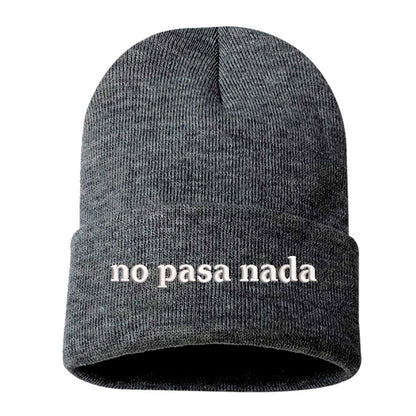 Flat lay of No Pasa Nada Spanglish gray beanie, a cozy winter hat with chill vibes