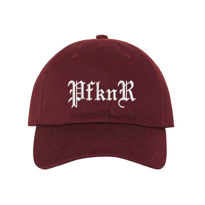 Burgundy embroidered baseball hat featuring &quot;PFKNR&quot; in bold lettering, designed for a confident and stylish streetwear look - DSY Lifestyle