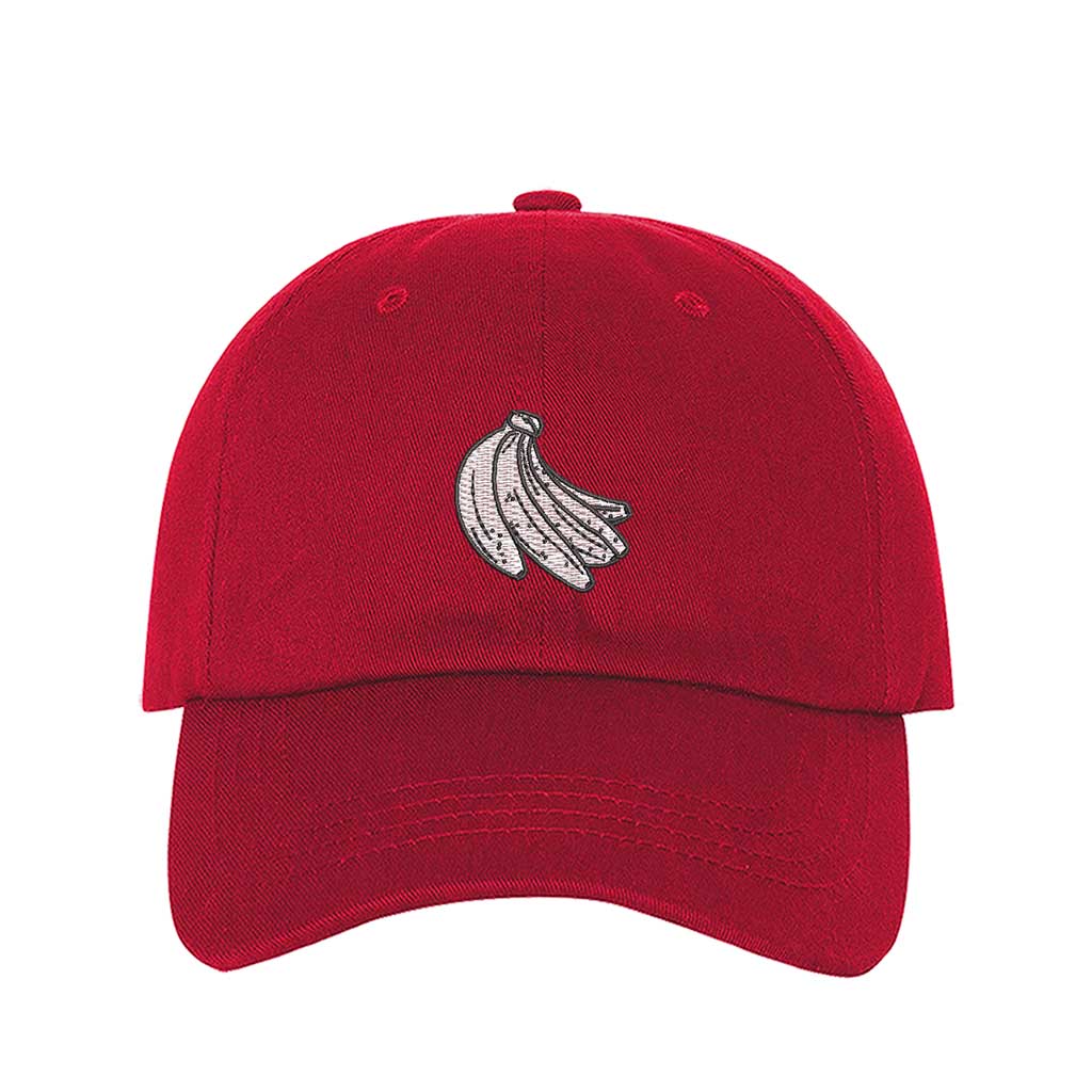 Red baseball hat with “Plátanos” embroidered in bold lettering, celebrating Puerto Rican culture with a fun and stylish touch - DSY Lifestyle