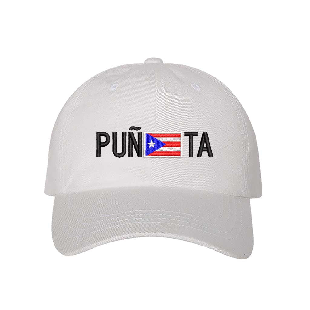 White embroidered baseball hat with &quot;Puñeta&quot; in bold lettering, featuring the Puerto Rican flag as the letter &quot;E,&quot; representing Boricua pride and culture - DSY Lifestyle