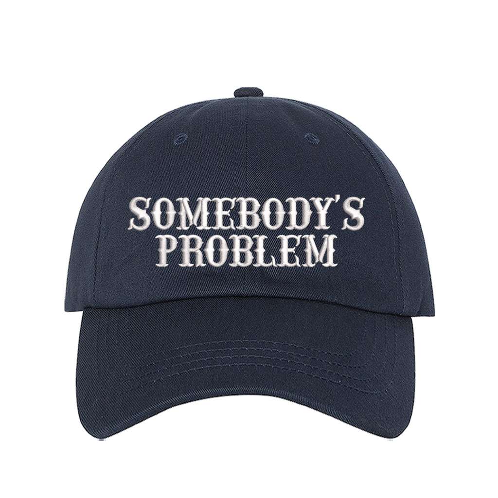 Navy Blue baseball hat embroidered with the phrase somebody&