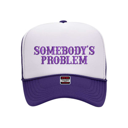Purple foam trucker hat with white front panel embroidered with the phrase somebody&