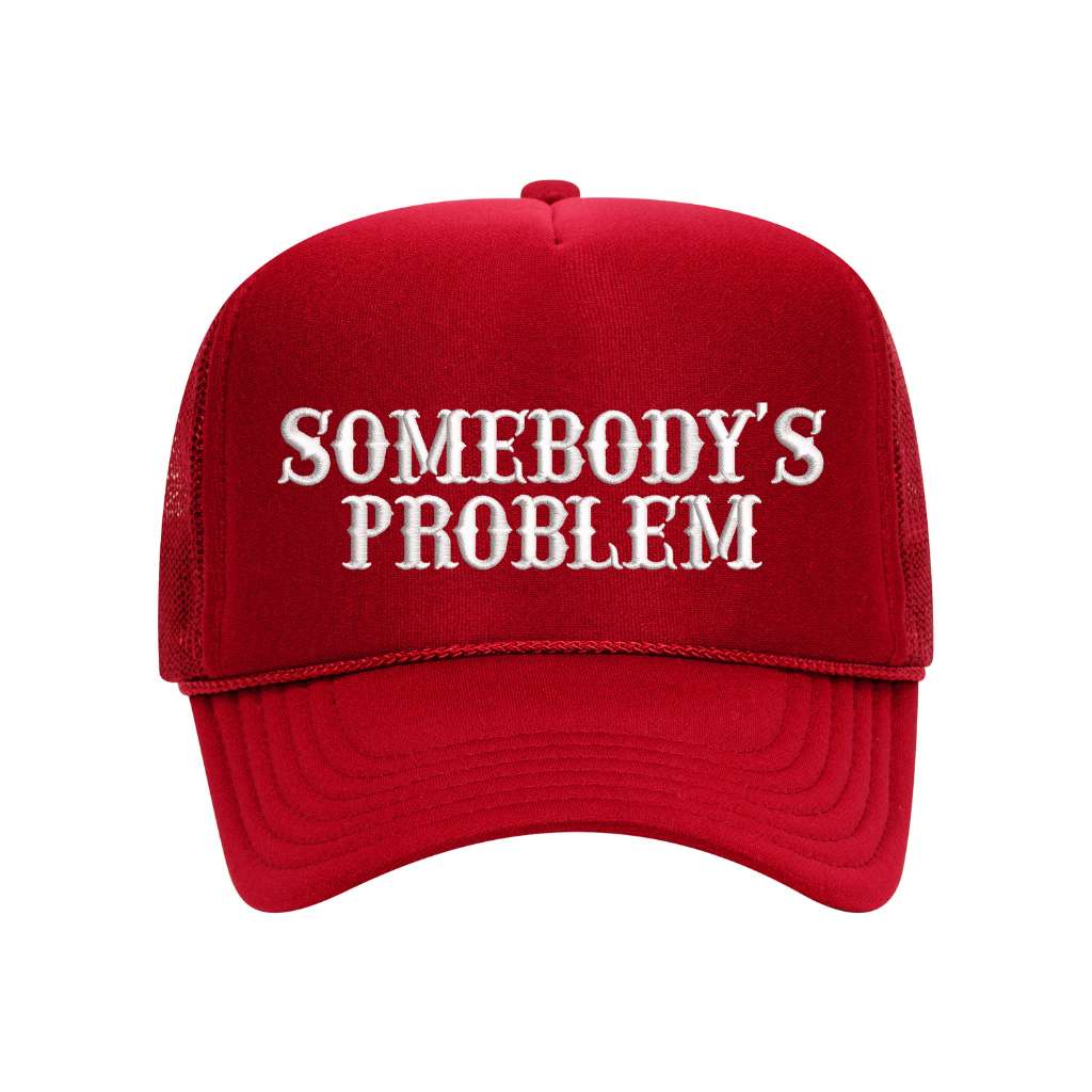 Red foam trucker hat embroidered with the phrase somebody&