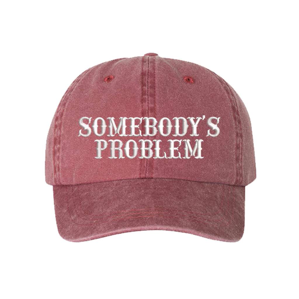 Washed Wine baseball hat embroidered with the phrase somebody&