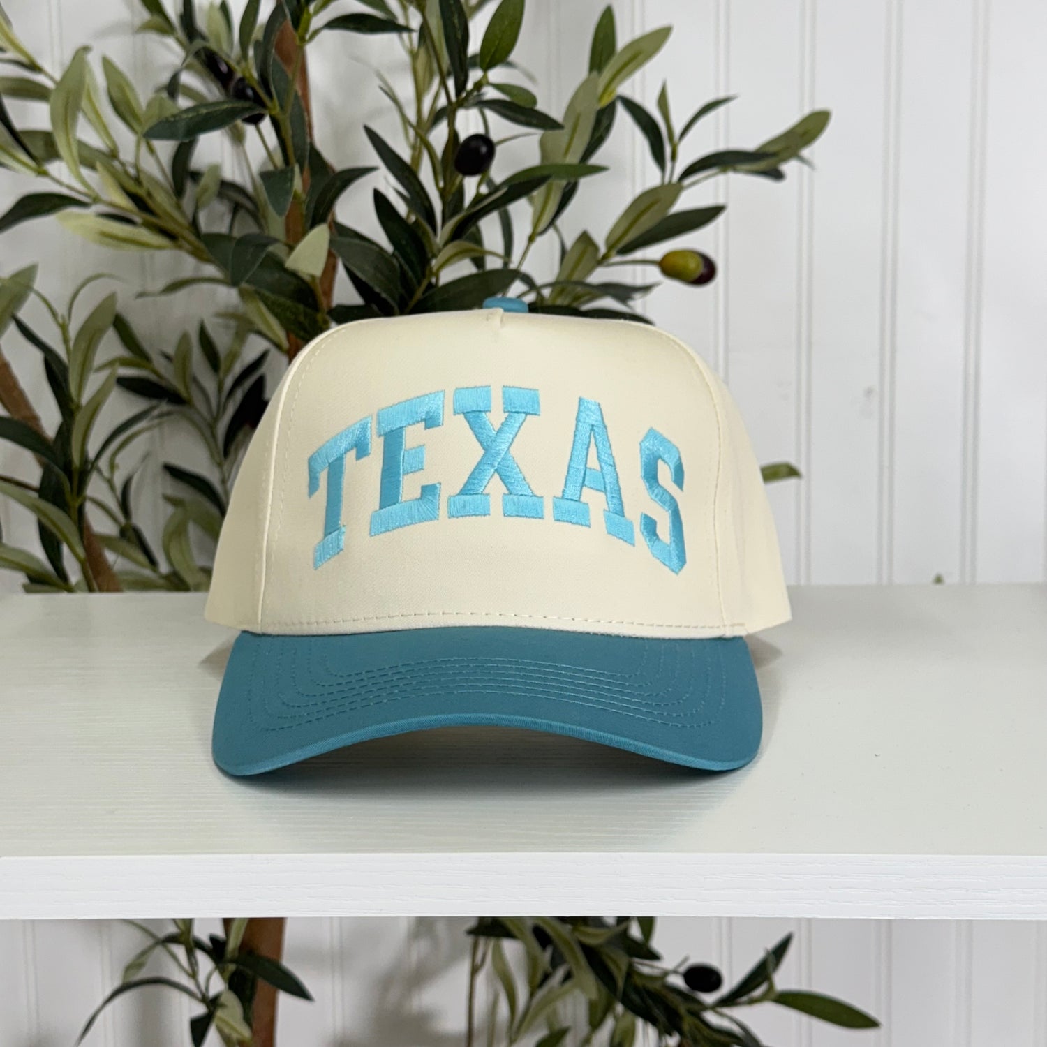 Aqua Texas Arched 5-Panel Two-Tone Embroidered Baseball Cap with bold arched Texas embroidery, a curved brim, and an adjustable strap, perfect for spring and everyday wear - DSY Lifestyle