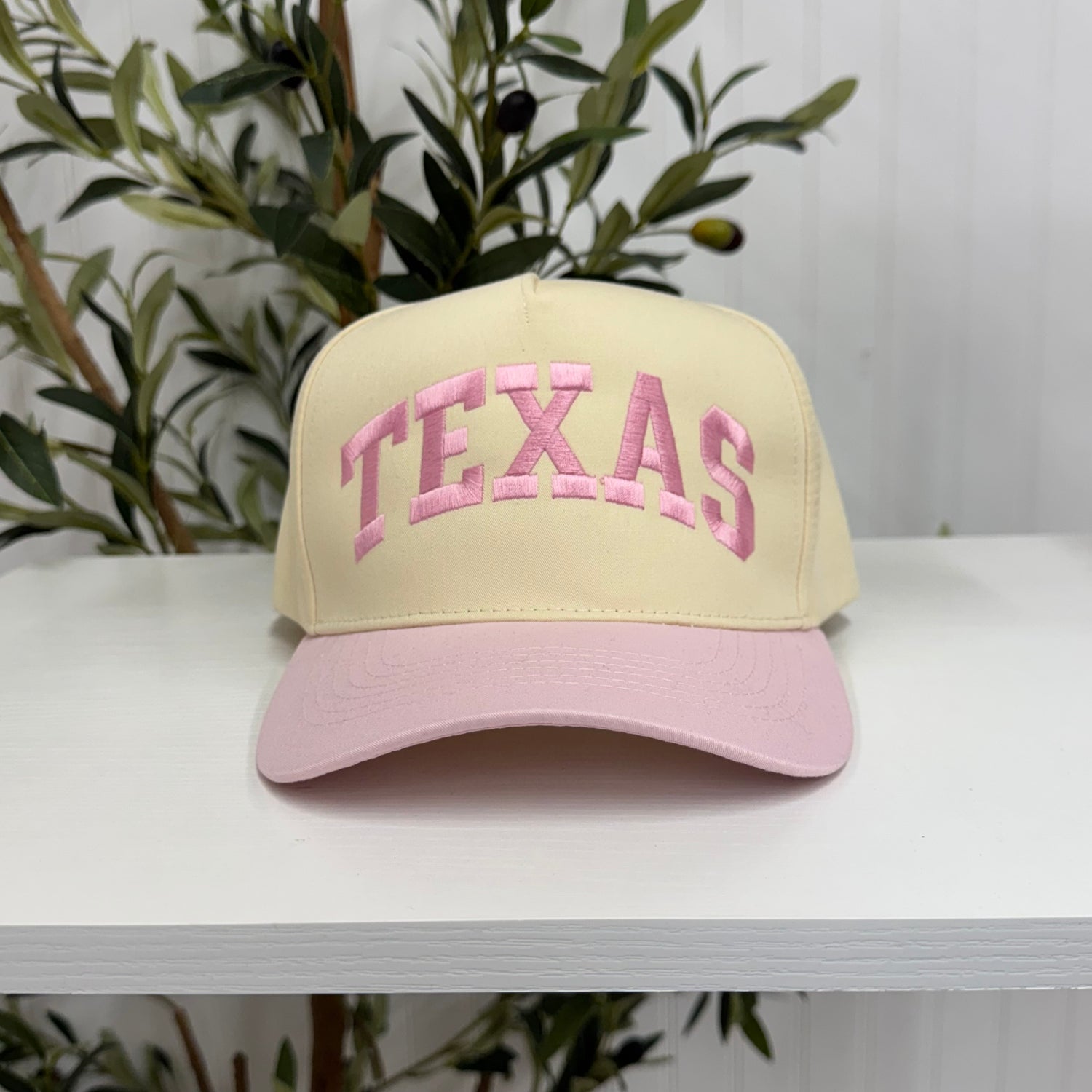 Light Pink Texas Arched 5-Panel Two-Tone Embroidered Baseball Cap with bold arched Texas embroidery, a curved brim, and an adjustable strap, perfect for spring and everyday wear - DSY Lifestyle