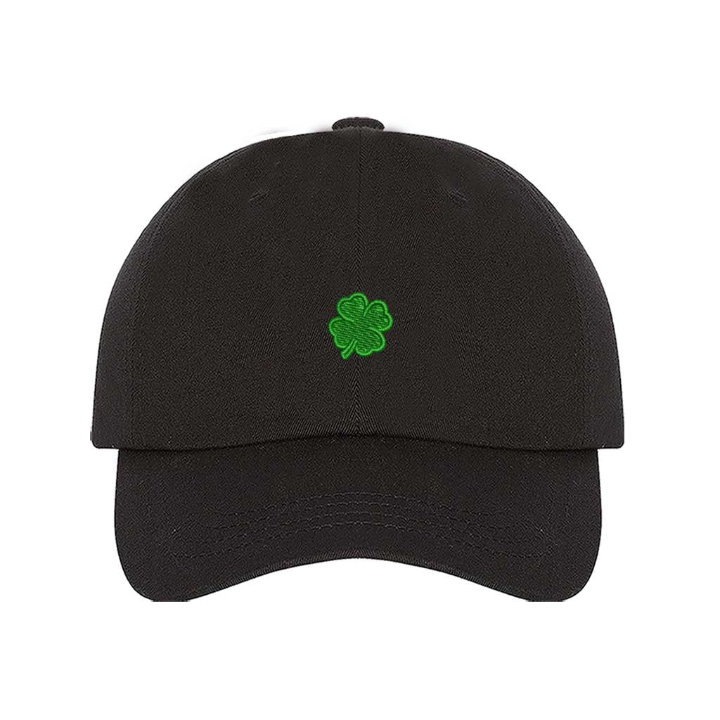 Black classic baseball hat with a small embroidered clover on the front, offering a clean, minimalistic, and stylish touch for any outfit - DSY Lifestyle