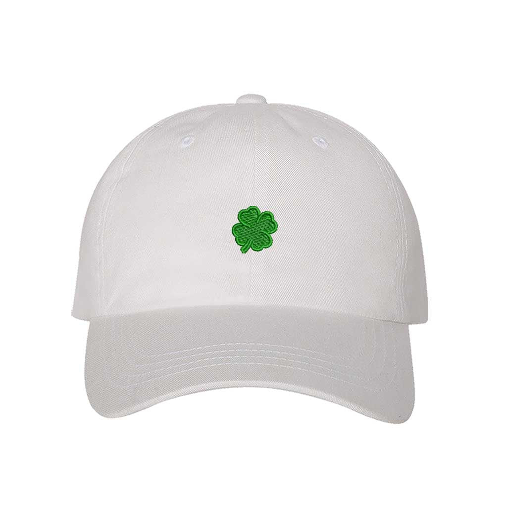 White classic baseball hat with a small embroidered clover on the front, offering a clean, minimalistic, and stylish touch for any outfit - DSY Lifestyle