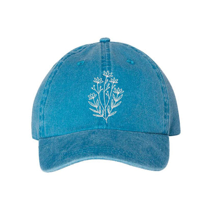 Washed turquoise baseball hat embroidered with a wildflower on it- DSY Lifestyle