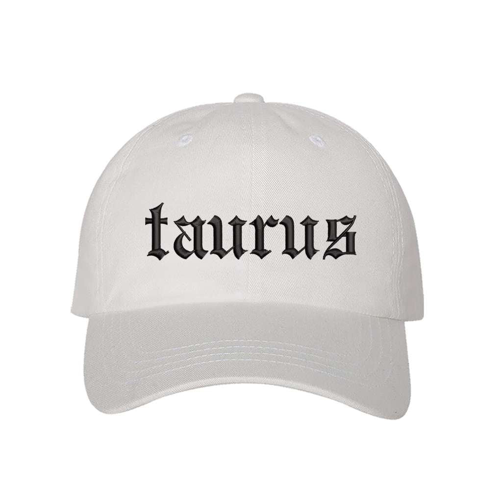 White baseball hat embroidered with the word taurus in english writing on it-DSY Lifestyle
