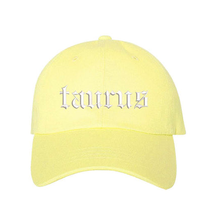 Yellow baseball hat embroidered with the word taurus in english writing on it-DSY Lifestyle