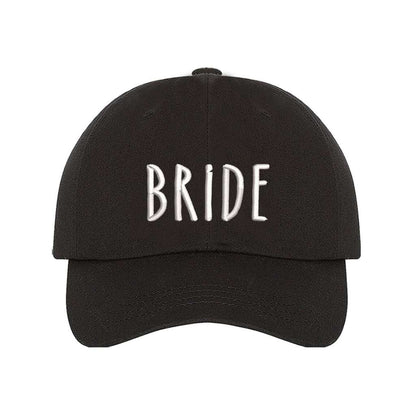 Black embroidered baseball hat with Bride stitched in elegant script, ideal for bachelorette parties, wedding planning, and honeymoon outfits - DSY Lifestyle