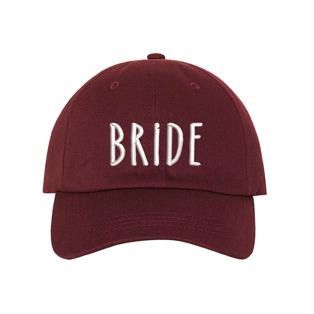 Burgundy embroidered baseball hat with Bride stitched in elegant script, ideal for bachelorette parties, wedding planning, and honeymoon outfits - DSY Lifestyle