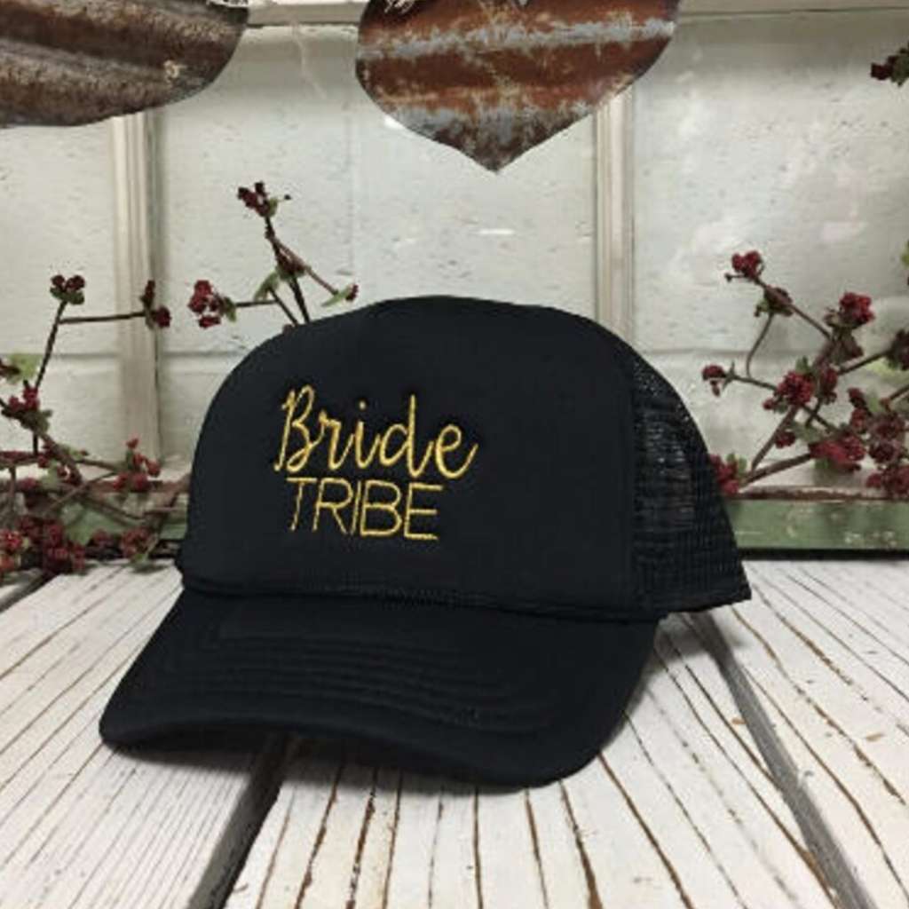 Black stylish white trucker hat with Bride embroidered in elegant gold thread, featuring a breathable mesh back for a comfy yet chic bridal look - DSY Lifestyle