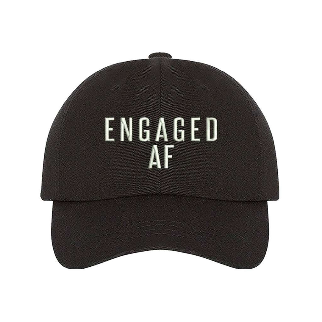 Black trendy embroidered baseball hat  with Engaged AF text, perfect for newly engaged brides-to-be celebrating their upcoming  wedding - DSY Lifestyle