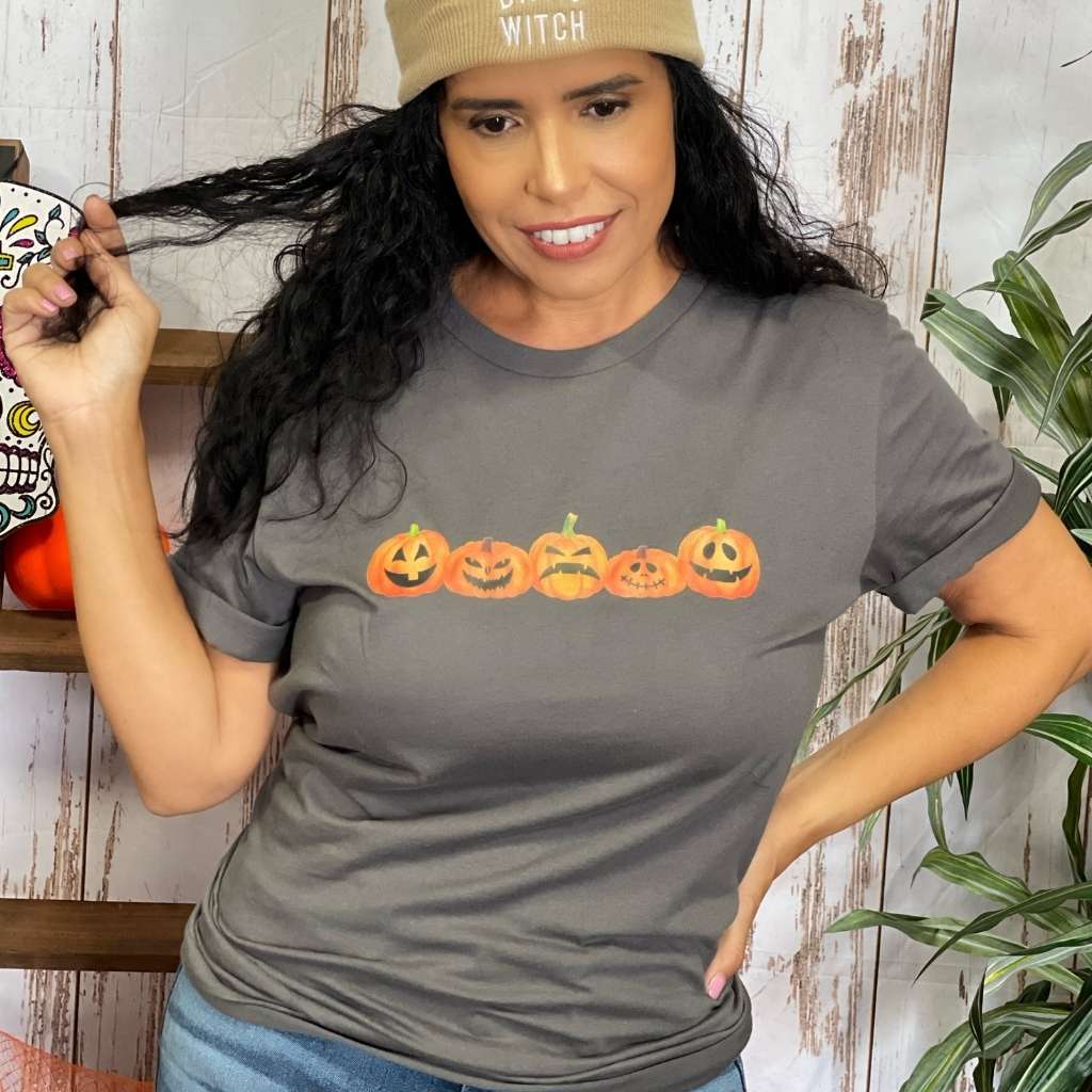 Female wearing gray Unisex Tshirt with 5 pumpkin printed in the front - DSY Lifestyle