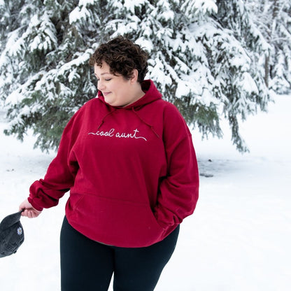 Female wearing a hoodie embroidered with Cool Aunt in the front - DSY Lifestyle